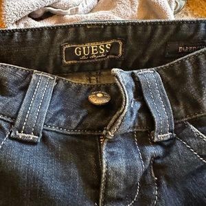 Size 24 guess jeans, daredevil boot, cut, dark denim stretchy